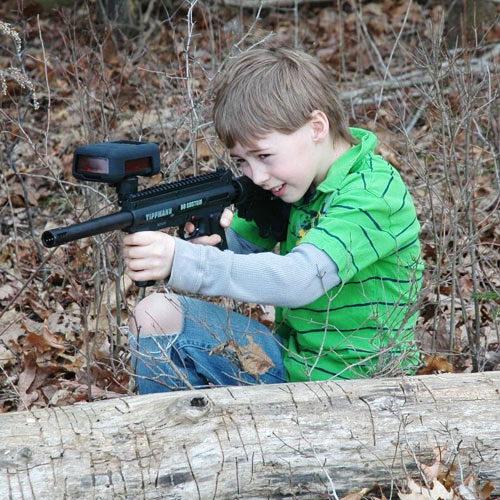 Young Boy Playing Laser Tag